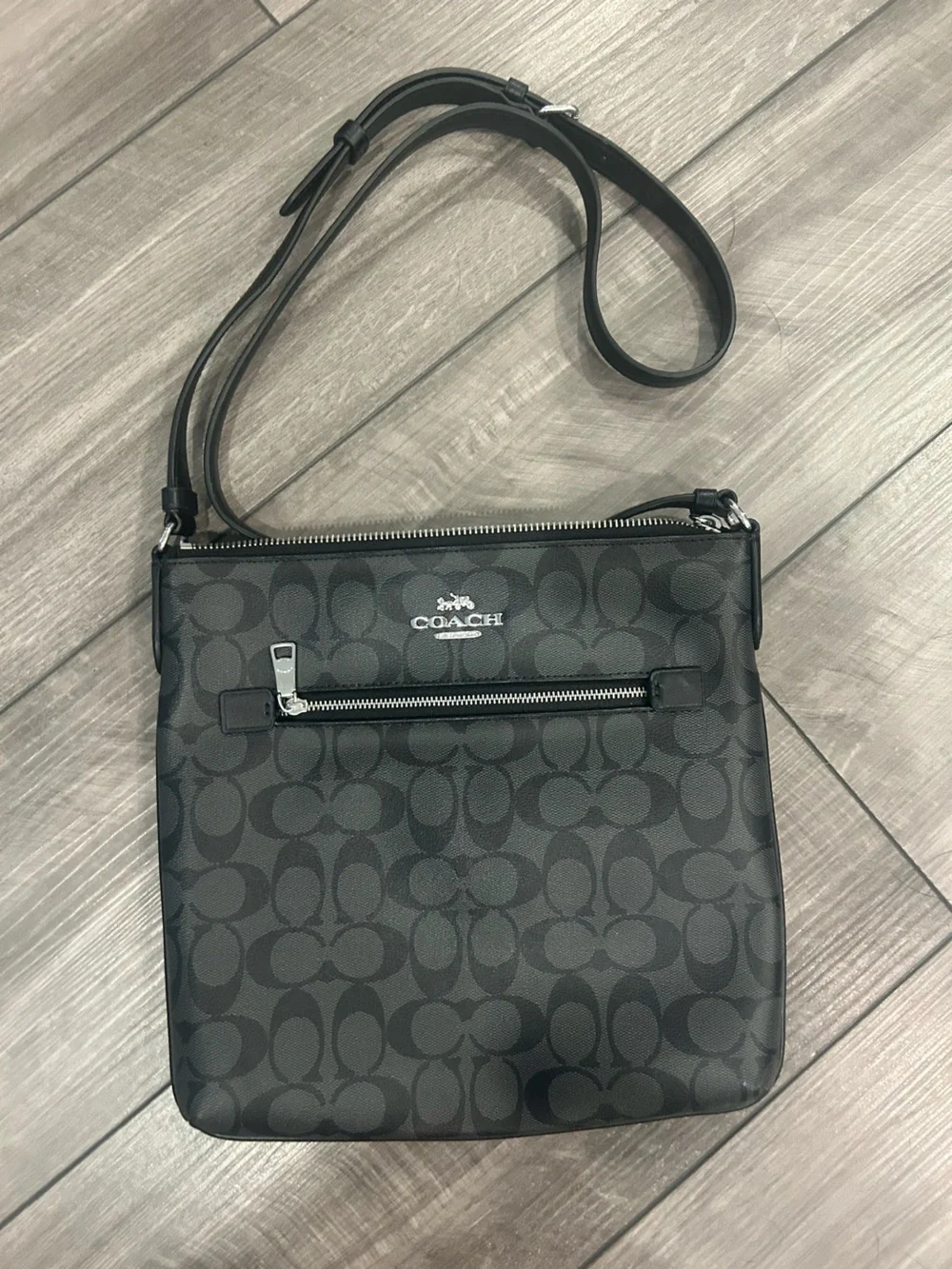 Coach women’s Signature Messenger Bag in Black/Gray